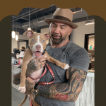 Dave Bautista holding Penny.